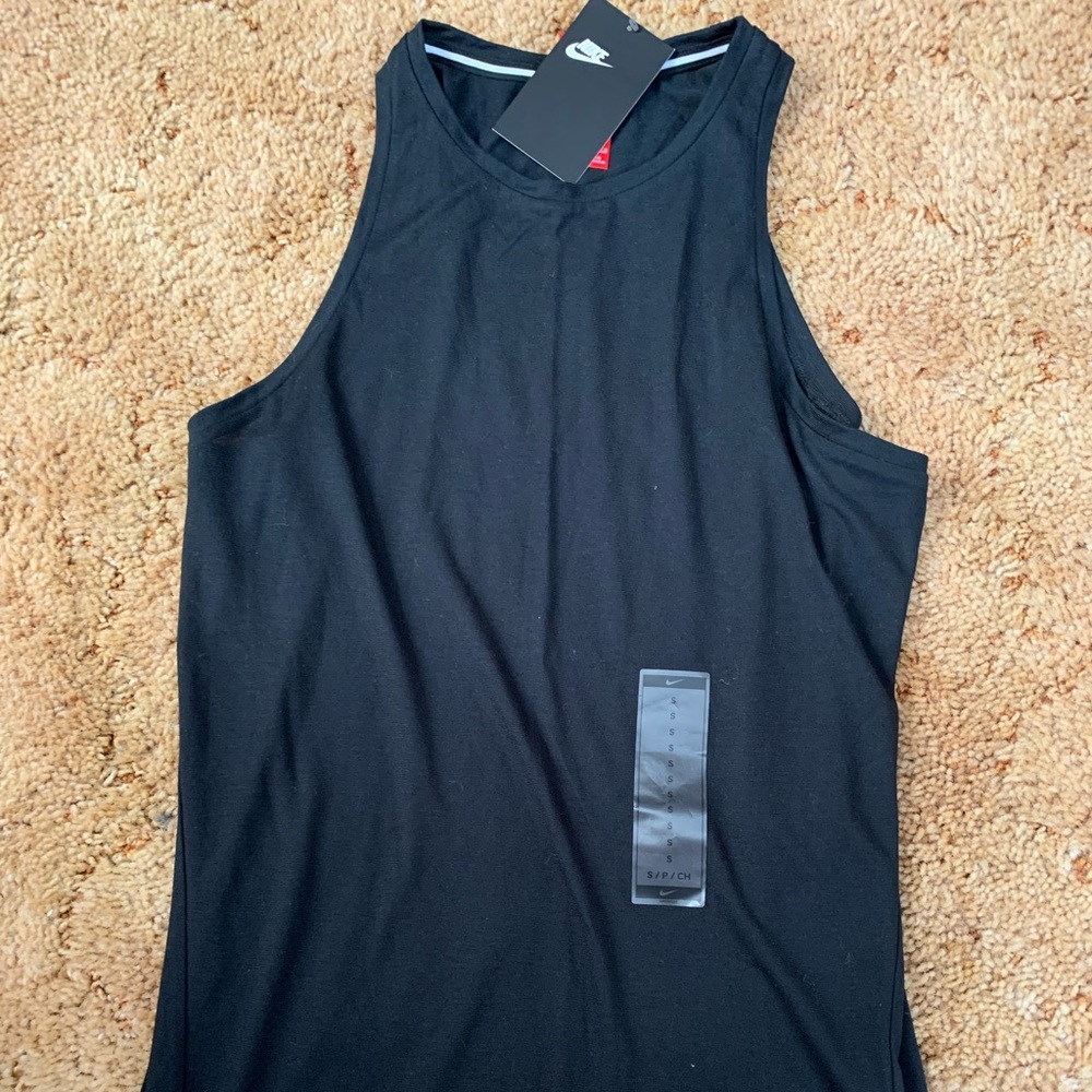 Black Nike tank top.